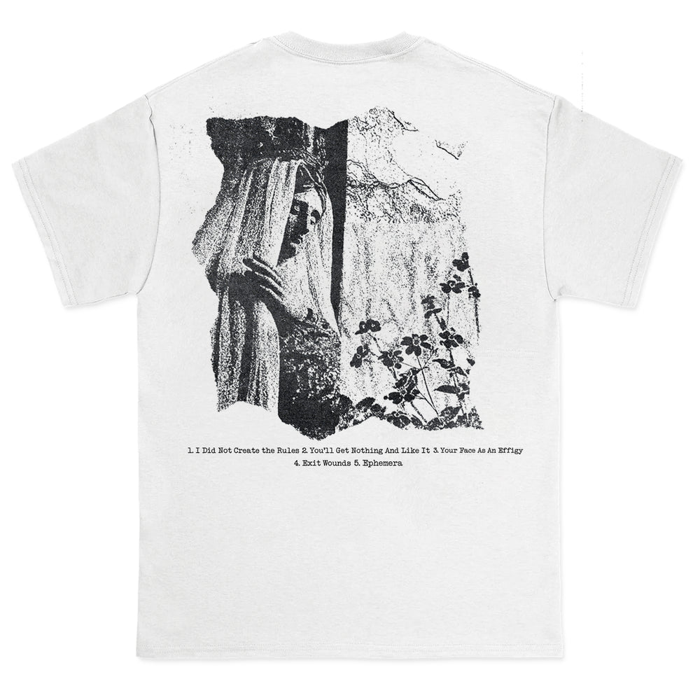 White t-shirt with a black and white nature scene printed on the back.