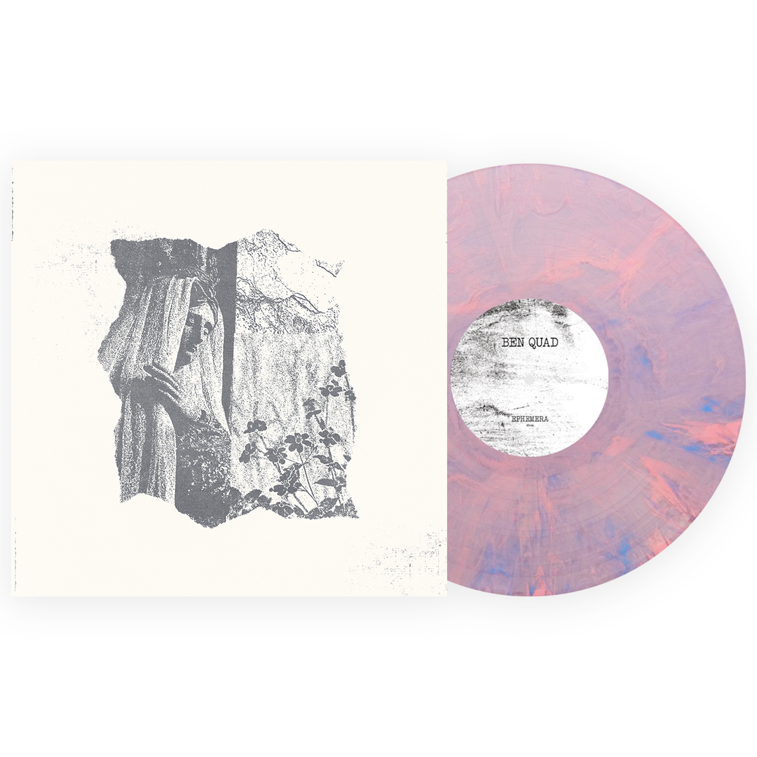 Vinyl record with a marbled pink and purple color pattern next to its album cover.